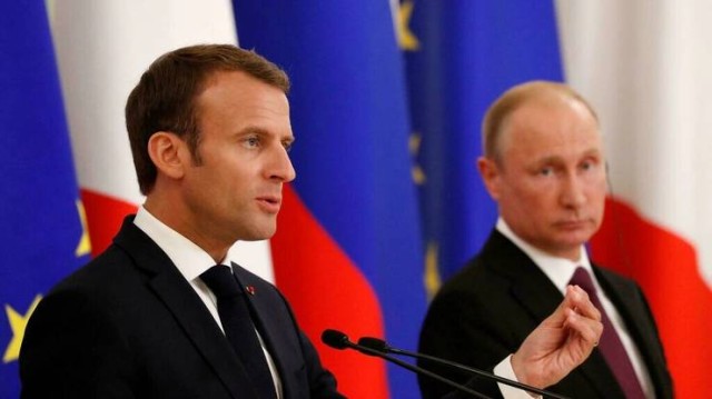 Macron şi Putin, de acord să încerce obţinerea unui armistiţiu în estul Ucrainei