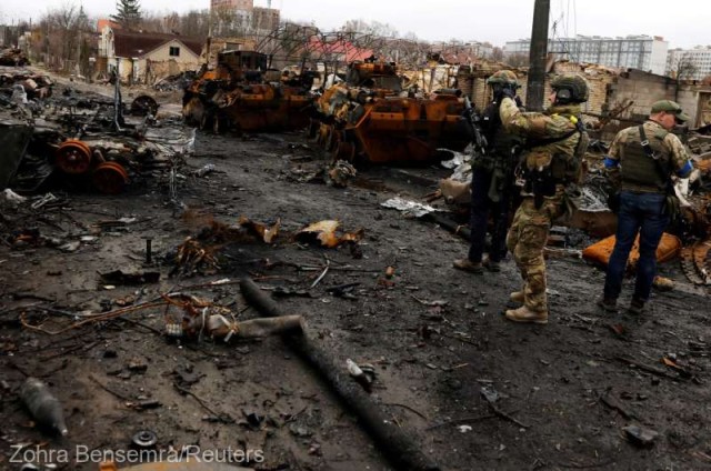 Ucraina: 57 de cadavre, descoperite într-o groapă comună la Bucea